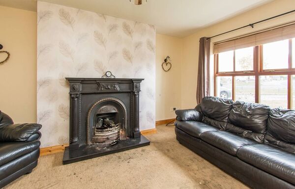 The living room with open fireplace.