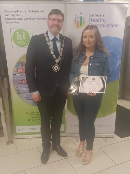 Latisha was an award winner at this year's local Garda Youth Awards. She is pictured at the ceremony with Cathaoirleach of Roscommon County Council, Cllr John Keogh.