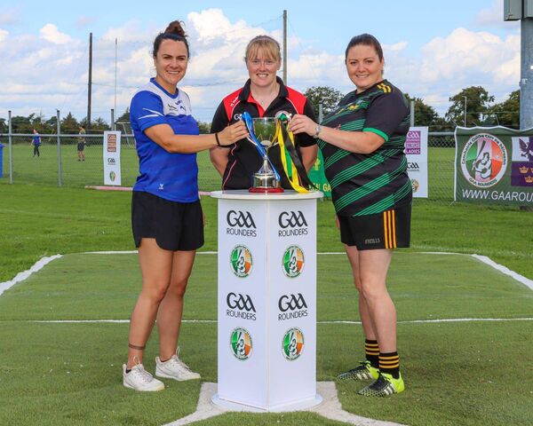 Michael Glaveys captain Linda Rogan, alongside her Kevin’s counterpart Erica Meslin and referee Danielle Moore before the 2023 All-Ireland intermediate ladies’ rounders final on Saturday week last.