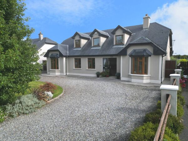 This fantastic four bedroom detached dormer bungalow is on the market at Ardsallagh Woods, Roscommon Town. 