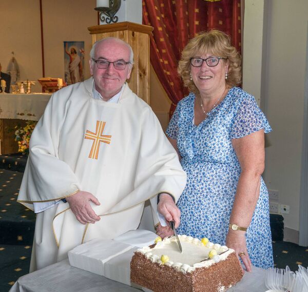Fr Alan Conway with Cortober Bingo Committee member Rosemary McDermott. Fr Alan has served over 28 years as a priest and was presented with a cake to mark the ocassion. Pic. Gerry Faughnan Fr Alan Conway with Cortober Bingo Committee member Rosemary McDermott. Fr Alan has served over 28 years as a priest and was presented with a cake to mark the ocassion. Pic. Gerry Faughnan