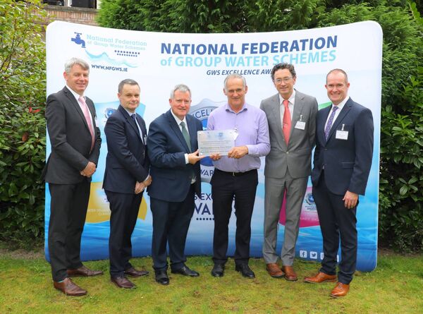 At the presentation of the awards were: Dónal Cronin (DHLGH), Douglas Kelly (DHLGH), Minister Kieran O’Donnell (DHLGH), Noel Carroll (Mid-Roscommon GWS manager), Cormac MacGearailt (EPA), and Barry Deane (NFGWS). At the presentation of the awards were: Dónal Cronin (DHLGH), Douglas Kelly (DHLGH), Minister Kieran O’Donnell (DHLGH), Noel Carroll (Mid-Roscommon GWS manager), Cormac MacGearailt (EPA), and Barry Deane (NFGWS).