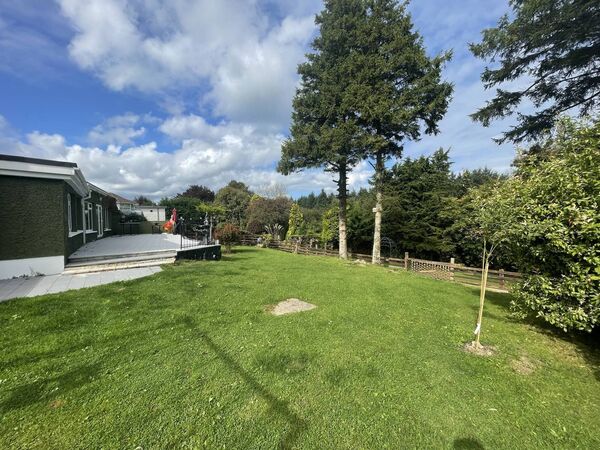 The property benefits from garden areas to the front and rear. 