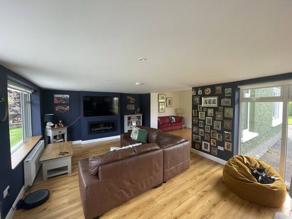 The opening plan sitting room/living area.