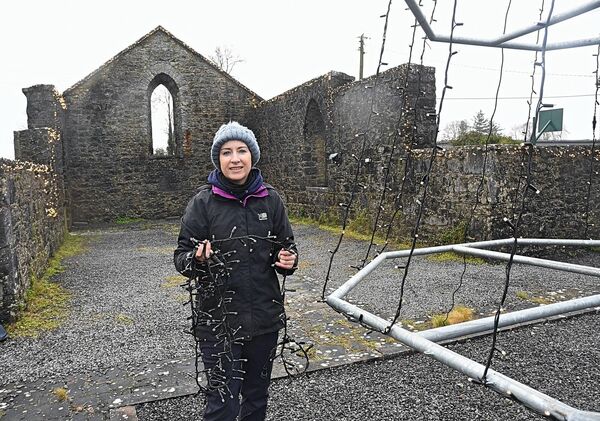 Orla Donnelly, Chairperson, Rahara Tidy Towns, pictured at the erection of the Christmas Lights at Rahara on Saturday. Pic. Gerard O’Loughlin