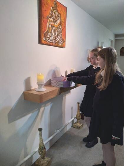 Isabelle Daly and Alanna Carroll from 1D pictured in the prayer room as part of the ‘In November We Remember’ RE programme. 