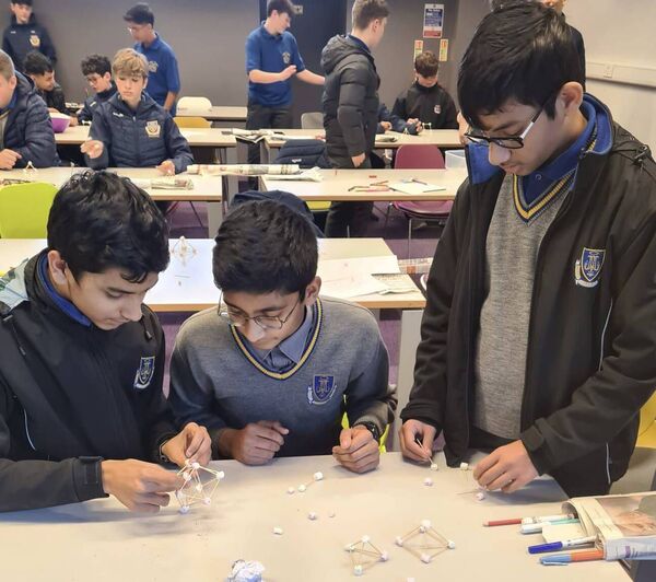 Second Year students Nauman, Hammad and Muqsit designing their sustainable engineering project.
