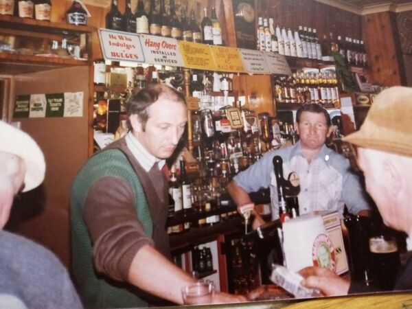 Brothers Tom &amp; Pat behind the bar
