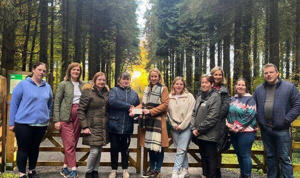 Members of Mote Park Conservation Group pictured at the presentation of a cheque to the group by members of Ballymurray National School Parents Association following the group’s recent fun walk in the park.