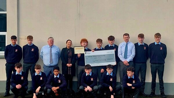 Students from CBS Roscommon, recently did a Sleep Out for Galway Simon in support of those experiencing or facing homelessness and raised €1,218. Photo shows the presentation of the cheque to Galway Simon. Pictured are Kevin Scollan, principal, Andrea Fitzgerald, Galway Simon and Francis Ferguson vice-principal with the students. 
