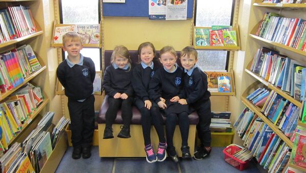 Pupils from Grange NS enjoying their time exploring the mobile library. Pupils from Grange NS enjoying their time exploring the mobile library.