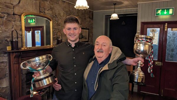 Michael Conroy, captain of the Castlerea St. Kevin's intermediate football team celebrates the team's Connacht championship final success with Johnny Walsh. Pic. Gerard O’Loughlin Michael Conroy, captain of the Castlerea St. Kevin's intermediate football team celebrates the team's Connacht championship final success with Johnny Walsh. Pic. Gerard O’Loughlin