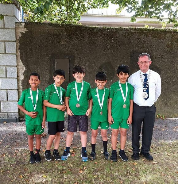 The Ballaghaderreen U-12 skittles team, with National President Gerry McGuinness, that won bronze medals at the national finals of Community Games in Carlow.