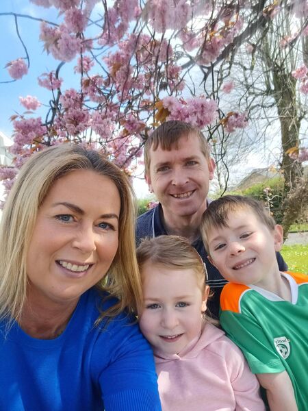 Collette Scollan from Leitrim Village who was diagnosed with a grade two meningioma, a type of brain tumour, in February 2022 with her husband Damian, son Cooper (age 6) and daughter Bonnie (age 5).