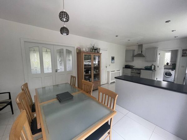 The modern kitchen/dining room. 