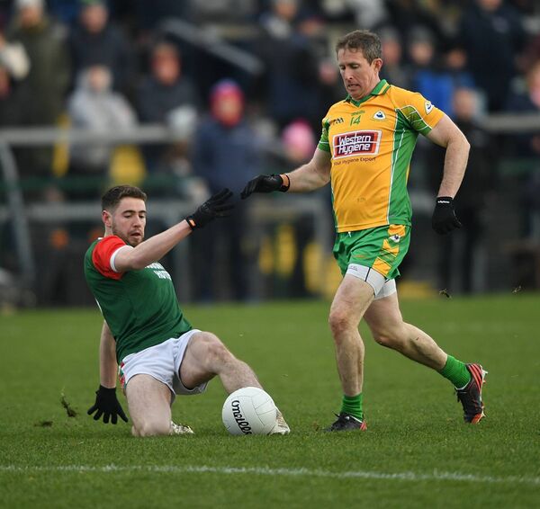 Eddie Nolan gets in ahead of Gary Sice to steal possession for the Roscommon champions in Sunday's Connacht Final. Eddie Nolan gets in ahead of Gary Sice to steal possession for the Roscommon champions in Sunday's Connacht Final.