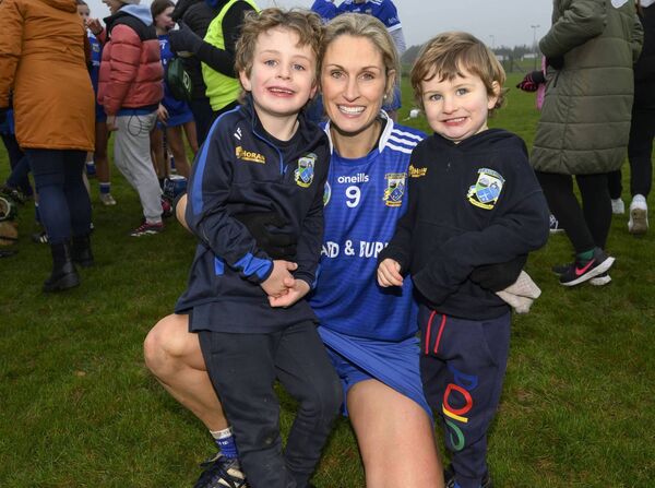 Athleague's Kelley Hopkins celebrates with her sons Iarla and Setanta after her team defeated St. Joseph’s Doora-Barefield on Sunday. 