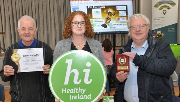 Joe Diskin and John Gill, Gorthaganny’s Fittest Farmers with Sabrina Lawless, Healthy Ireland Co-ordinator Roscommon County Council. Pic. Liam Reynolds 