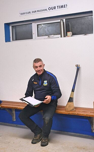 Athleague senior camogie manager, Liam Gordon, making some final notes ahead of training in Athleague on Friday evening. Athleague senior camogie manager, Liam Gordon, making some final notes ahead of training in Athleague on Friday evening.