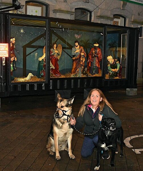 Samantha Scally, Lisnamult with Sully and Rasca at the lnew crib with life-size figures, which was unveiled on Saturday in Roscommon Town. Pic. Gerard O'Loughlin