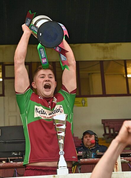 Castlerea St. Kevin's captain, Michael Conroy, lifts the Gene Byrne Cup to confirm his side as Connacht intermediate football champions last month. Picture: Gerard O'Loughlin