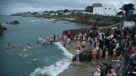 In Pictures: Hundreds brave cold water at the Forty Foot for Christmas swim