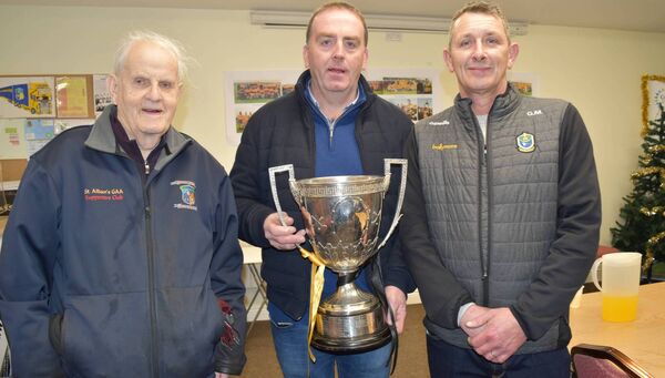 Phonsie Tully, John Cunniffe and Gerry Mulry with the Mickey Cunniffe Cup, won by Four Roads Hurling Club in 2022. Phonsie Tully, John Cunniffe and Gerry Mulry with the Mickey Cunniffe Cup, won by Four Roads Hurling Club in 2022.