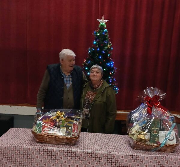 Pictured are Seamus Keane and Rose Curley who won hampers at the Clooneycolgan Progressive 25 Drive before Christmas.