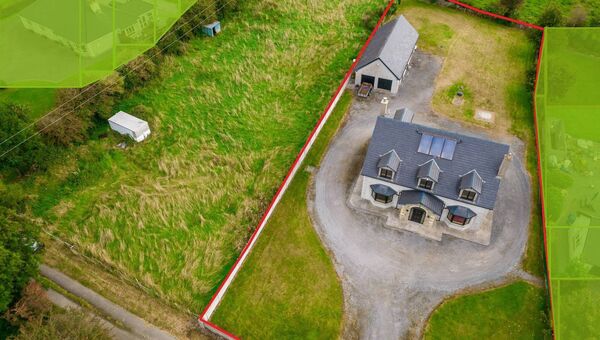 The property sits on C.1.1 acres of manicured lawns.