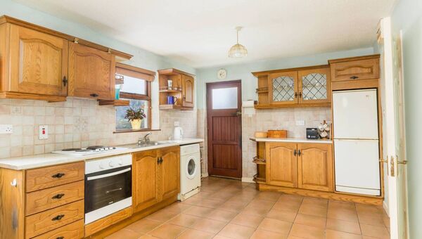 The kitchen area is large and well fitted out.