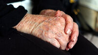 Coroner urges people to check in on those living alone 