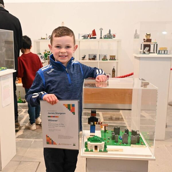 James Sturgeon with his LEGO® model of Newgrange.