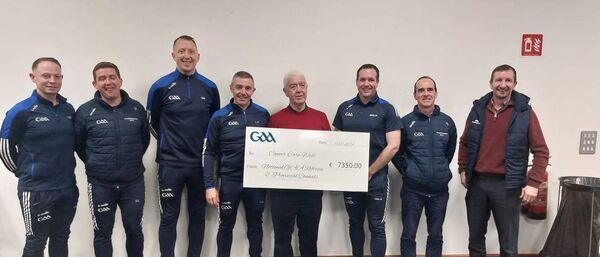Members of the national panel of intercounty referees pictured presenting a charitable donation of €7,350 for Cancer Care West to outgoing Referee Development Committee Chairperson, Seán Martin. Picture: Courtesy of GAA.ie
