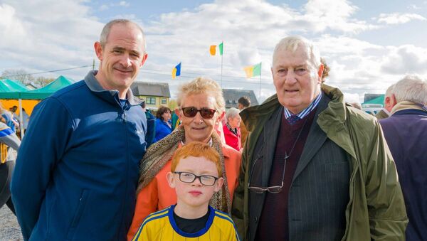 The late Aidan Kelleher, captain of the Shannon Gaels team that won the 1964 Roscommon Senior Football Championship pictured with his family, Maura, Gary and Dylan after Aidan carried out the grand opening of Shannon Gaels renovated pitch in Croghan in September 2019. Picture: Gerry Faughnan