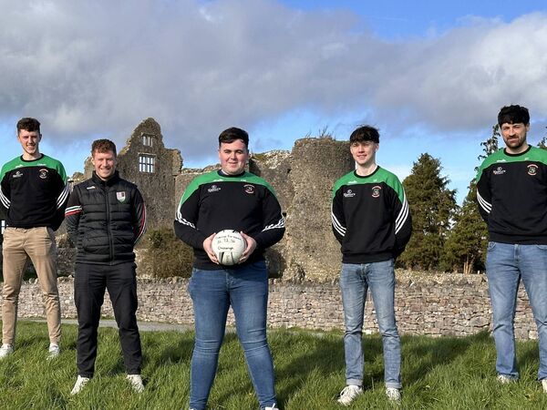 Ciaran McManus, Brian Kelly, Emmet Burke, and Eoghan Diffley with Conor Murphy. 