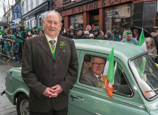 Grand Marshall of the Carrick-on-Shannon parade Johnny Murray, who portrayed St Patrick in Carrick-on-Shannon parades for 34 years, arrived at the reviewing stand in Stevie Faughnan’s vintage car. Stevie is a well-known vintage car enthusiast and businessman based on the Kilmore Road, Carrick on Shannon, Co Roscommon. Pic. Gerry Faughnan