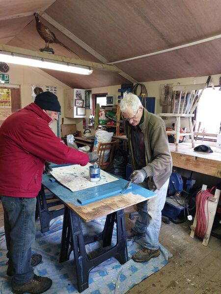 Members of Strokestown Men's Shed working on the restoration of the old furniture. Members of Strokestown Men's Shed working on the restoration of the old furniture.