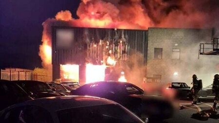 Number of cars damaged following fire at a motor garage in Dublin