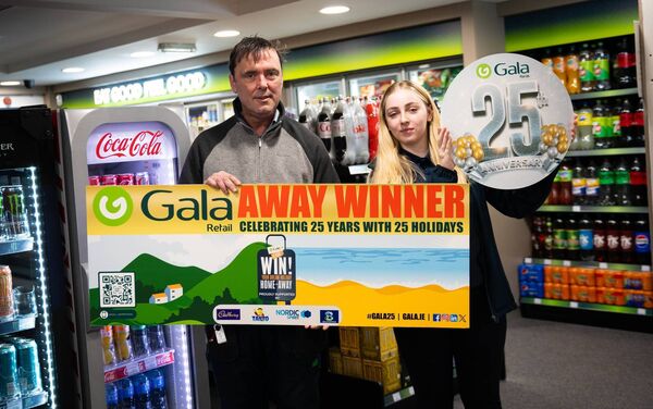 Robert Byrne from Boyle and Aine Arnold from Harkin’s Gala, Ballybofey, County Donegal at the presentation to Robert of a holiday voucher worth €4,000, which he won in Gala Retail’s Home or Away store promotion. 