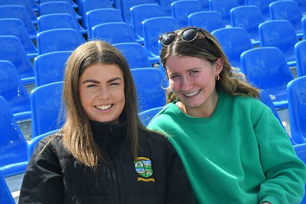 Sinéad Mannion and Orla Connolly supporting the Roscommon U-17 hurlers during their recent Celtic Challenge Cup victory against Wicklow at Dr. Hyde Park. Picture: Gerard O'Loughlin