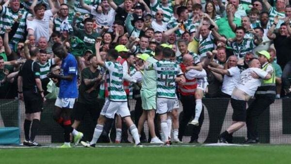 Celtic go six points clear with 2-1 win over 10-man Rangers