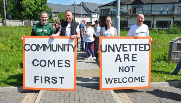 Justin Slaman, Vincent Beirne, Teresa O'Connell, and Nial Hussey at the protest in Castlerea this afternoon. Pic. Liam Reynolds