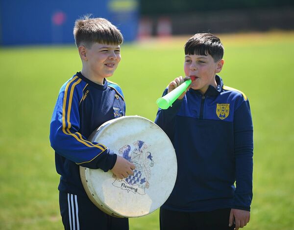 Cloonfad United supporters Jayden Cunniffe and Cian Fleming getting behind their team during Sunday's Challenge Cup semi-final against Moore United at Lecarrow. 