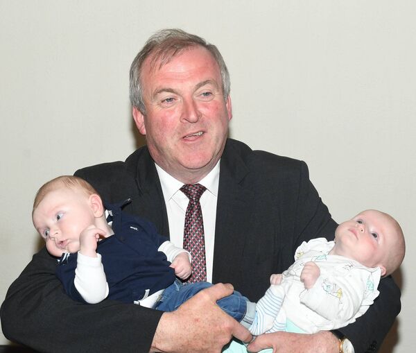 Cllr John Cummins pictured with two of his grandchildren Katie Noone and John Patrick Conroy at a previous election count in Roscommon. Pic. Gerard O’Loughlin