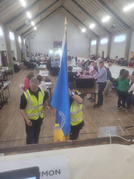 The Roscommon flag and the Tricolour are in the building. 