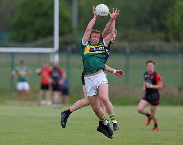 Keith Hegarty, St Michael's, rises above Liam Creedon. Picture: Jim Coughlan. Keith Hegarty, St Michael's, rises above Liam Creedon. Picture: Jim Coughlan.