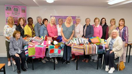 County Roscommon women's shed members present their ‘Blankets of Hope’ to Hospice