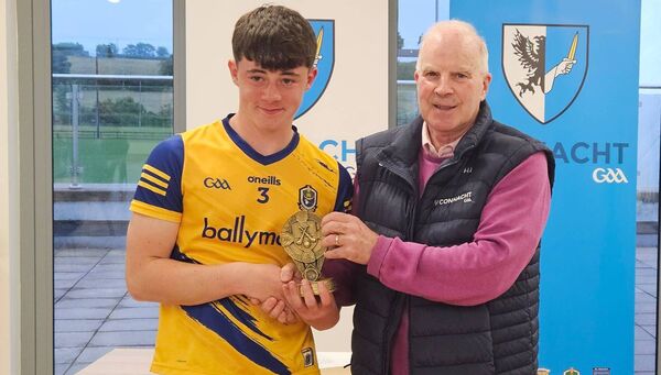 Connacht U-16 Poc Fada champion, Colm Fitzgerald, St. Dominic's, with Anthony Flaherty, Connacht GAA Council. 