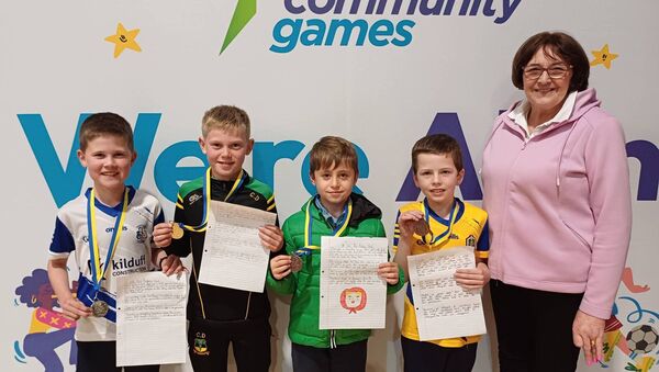 Medal winners in the U-10 boys’ handwriting competition at the Community Games finals in Kilbride. L-r: T.J. Gilleran, Knockcroghery; 1st, Cathal Duggan, Kiltullagh; Joint 3rd, Tommy Wade, Kiltoom/Cam; Cillian Horkan, Kiltullagh, and Maura McCormack, Roscommon Community Games Vice-President.