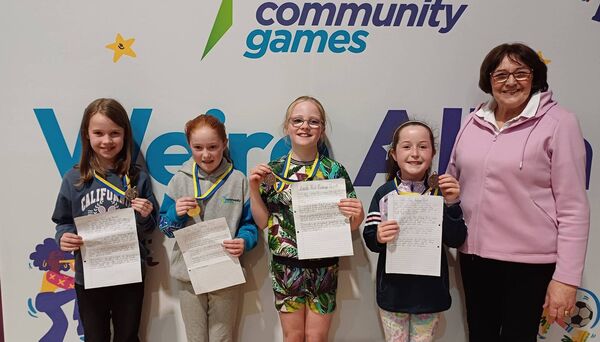 Medal winners in the U-12 girls handwriting competition at the Community Games finals in Kilbride. L-r: 2nd, Anna Dolan, Tarmonbarry/Scramogue; 1st, Connie McGowan, Croghan/Drumion/Cortober; 3rd, Grace-Rose Dolan, Moore; 4th, Muireann Feeney, Balintubber/Ballymoe, and Maura McCormack, Roscommon Community Vice-President.